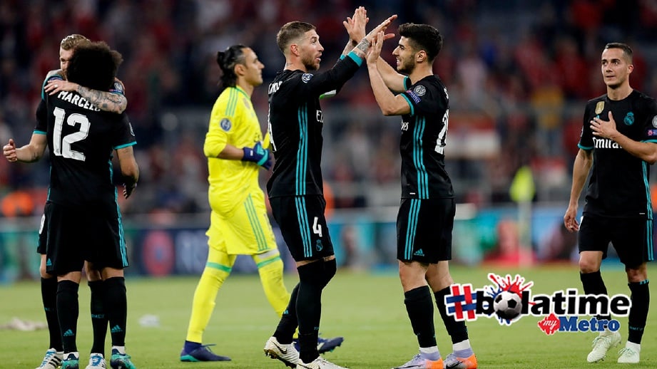 PEMAIN Real meraikan kemenangan mereka ketika menewaskan Bayern dalam aksi separuh akhir Liga Juara-Juara. -Foto EPA