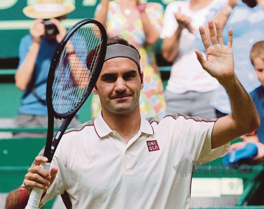 GAYA Federer selepas menewaskan  Herbert di Halle Westphalia,  Jerman.