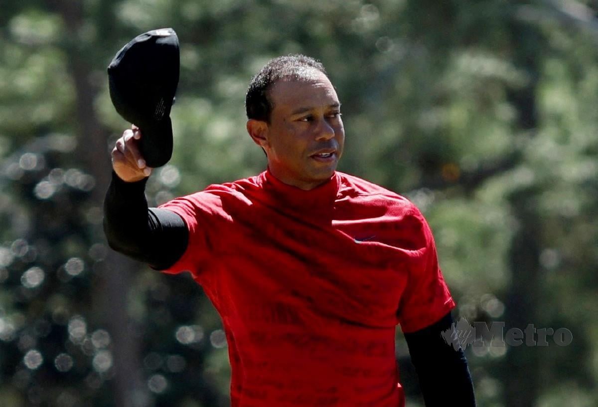 Golf - The Masters - Augusta National Golf Club - Augusta, Georgia, U.S. - April 10, 2022Tiger Woods of the U.S. on the 18th green during the final round REUTERS/Mike Segar     TPX IMAGES OF THE DAY     