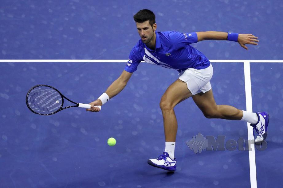 AKSI Djokovic ketika menentang Struff. FOTO AFP 