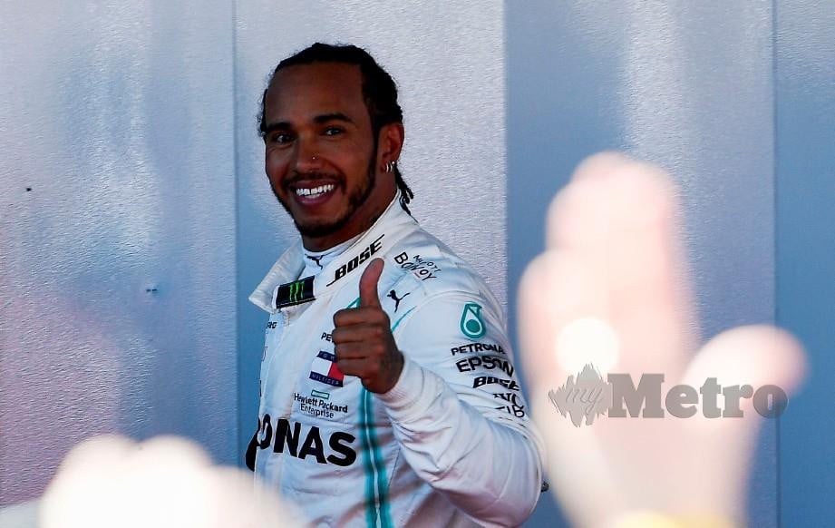 Hamilton ceria selepas ungguli perlumbaan F1 Grand Prix Sepanyol. FOTO AFP