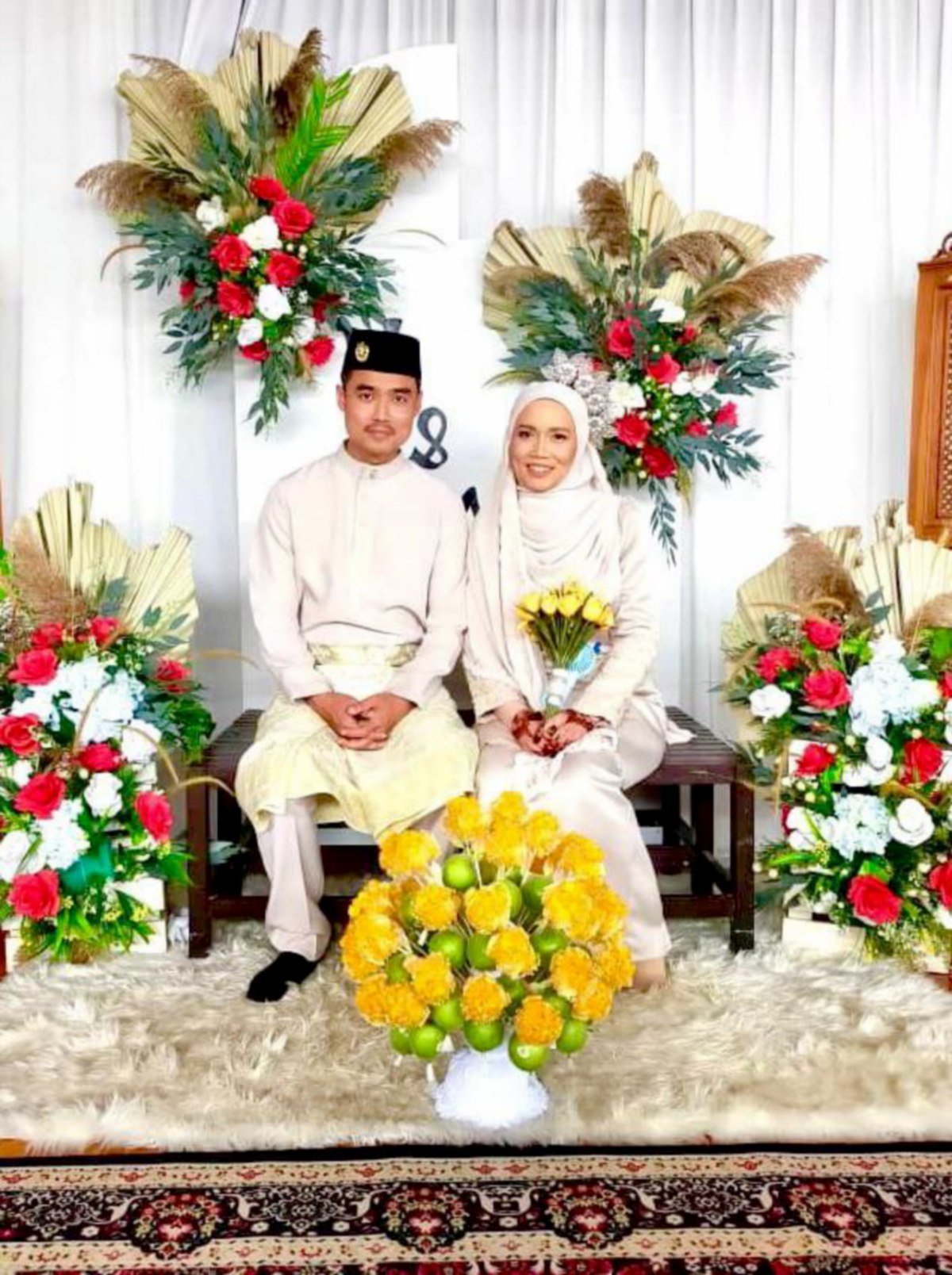 SITI Masnida bersama suami, Mohd Yusri. FOTO Ihsan Siti Masnida Abdul Malek