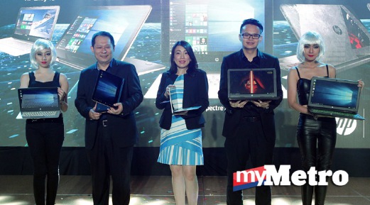 PENGARAH Urusan HP PPS Sdn Bhd, Kym Lim (tiga kiri) mempamerkan lima produk baru yang dilancarkan. FOTO Nurul Shafina Jemenon
