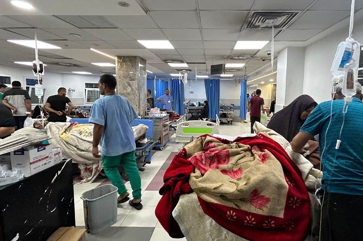 FOTO fail menunjukkan pesakit menerima rawatan di Hospital Al-Shifa, Gaza. FOTO AFP 