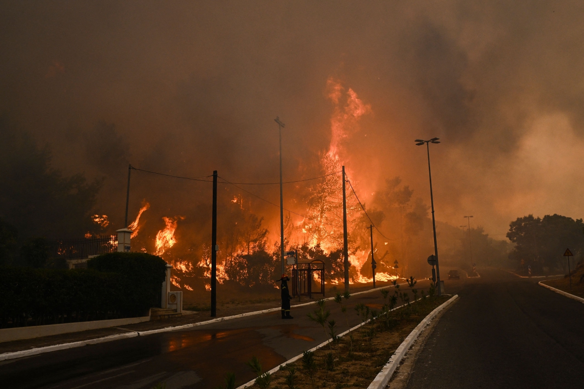 KEBAKARAN hutan terus berlaku di Greece. Ini termasuk kebakaran di Chasia (gambar) di pinggir Athens. FOTO AFP 