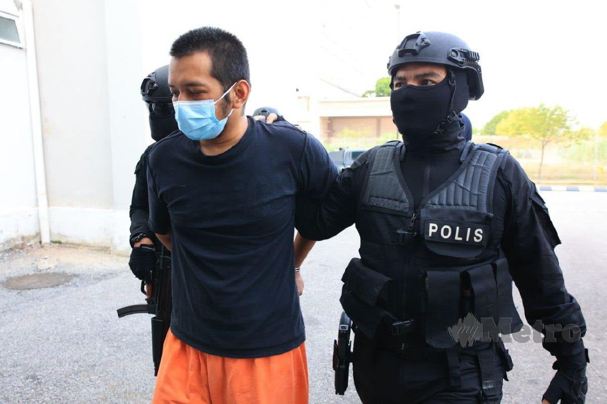 HAFIZUL ketika dibawa dibawa ke Mahkamah Sesyen Kota Bharu, hari ini. FOTO Nik Abdullah Nik Omar 