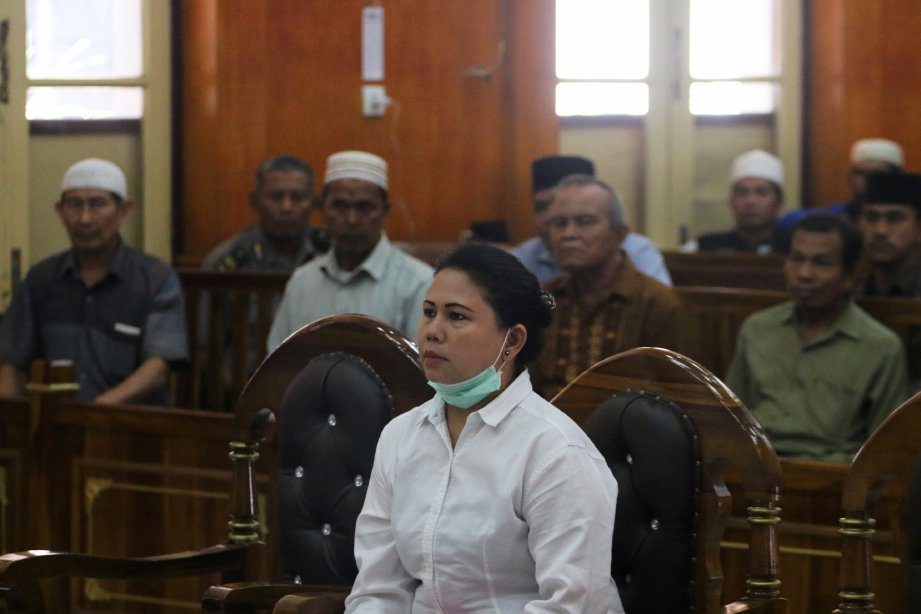 MEILIANA ketika perbicaraan kesnya di mahkamah di Medan. Foto REUTERS
