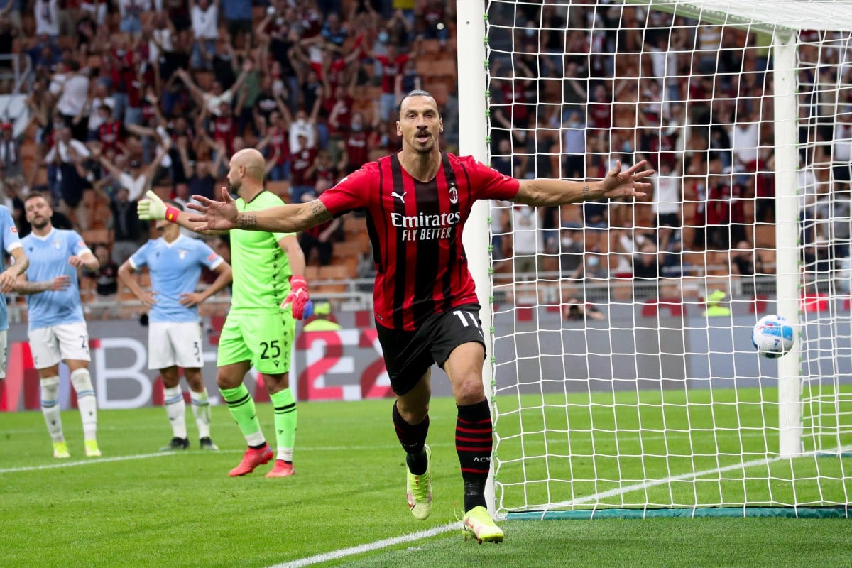 Penyerang AC Milan, Zlatan Ibrahimovic meraikan jaringannya ketika berdepan Lazio dalam aksi Serie A di Stadium Giuseppe Meazza dekat Milan. FOTO EPA
