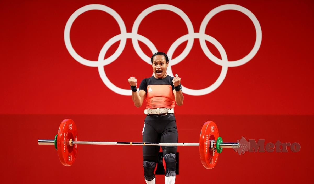 LOA Dika Toua dari Papua New Guinea menamatkan acara angkat berat wanita kategori 49kg - Snatch di Tokyo 2020, hari ini. FOTO EPA