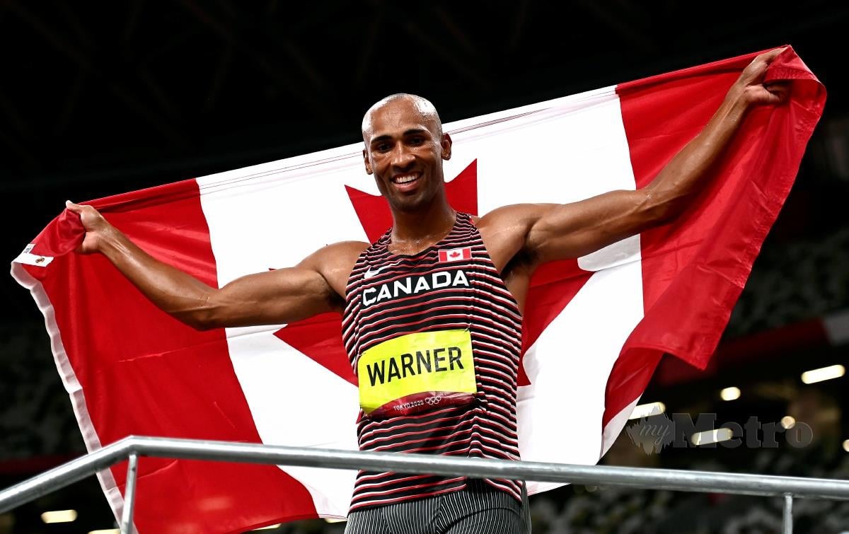 ATLET Kanada, Damian Warner menang pingat emas acara decathlon di Tokyo 2020 dengan mencatatkan rekod baharu Sukan Olimpik, hari ini, FOTO EPA 