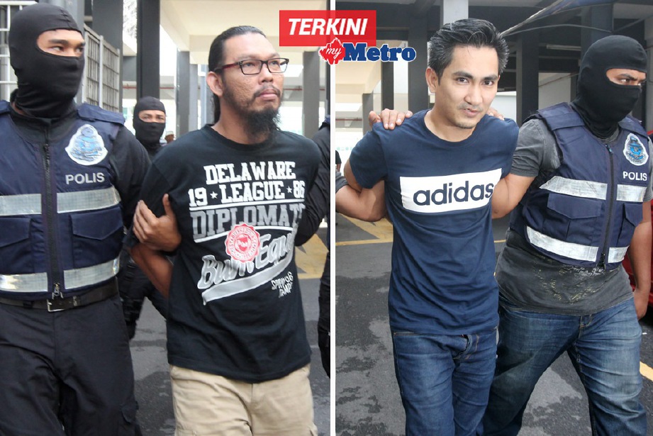 HIZMI Razli (kiri) dan Tengku Shukri dihadapkan di Mahkamah Majistret Kota Bharu. FOTO Zamaun Huri Isa