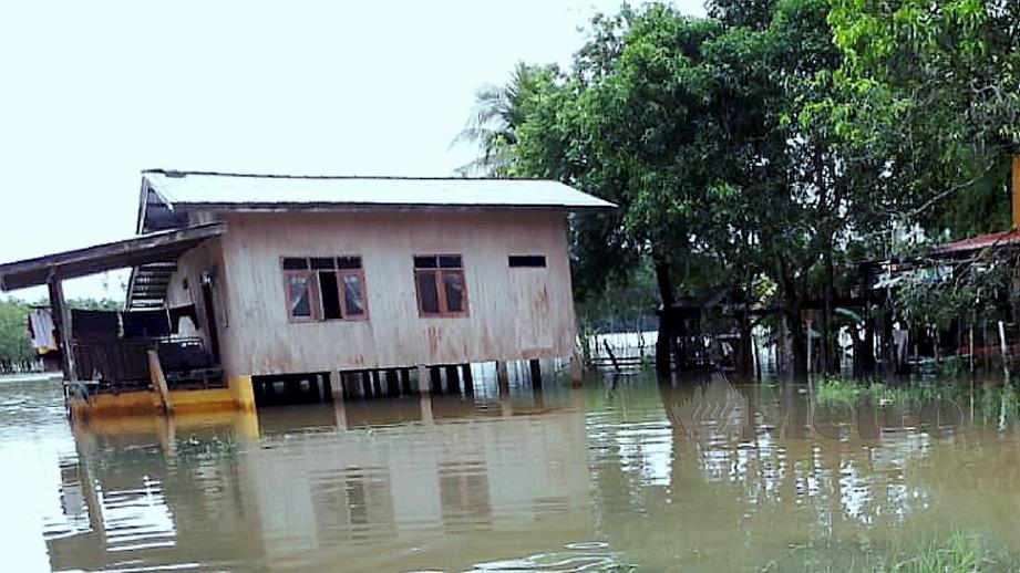 ANTARA kawasan dilanda banjir di Rantau Panjang tahun lalu. FOTO arkib NSTP