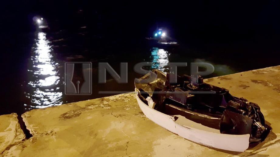PASUKAN Polis Marin melakukan operasi mencari kereta yang dipercayai kenderaan SUV putih terjatuh ke dalam laut selepas terbabit dalam kemalangan jalan raya dengan Toyota Vios di kilometer 4 Jambatan Pulau Pinang. FOTO Mikail Ong