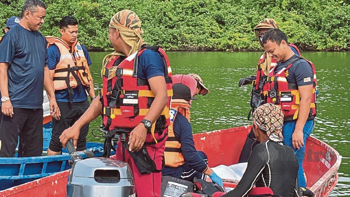 Operasi mencari dan menyelamat seorang remaja lelaki dipercayai lemas di Sungai  Besut di Kampung Tanjung Lali, Kampung Raja, Besut hari ini. FOTO Bomba