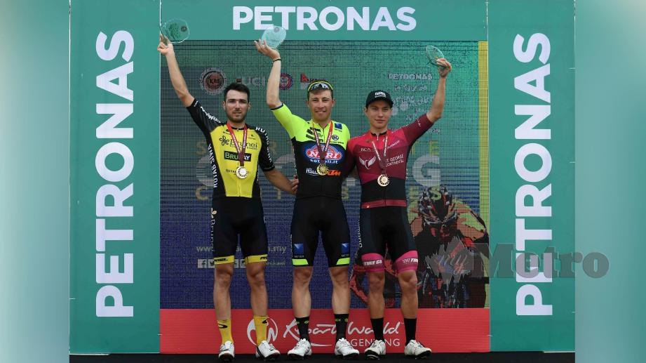 Bevilacqua (tengah) bersama Kastrantas (kiri) dan Wiggins di atas podium pemenang peringkat ketujuh. FOTO AFP 