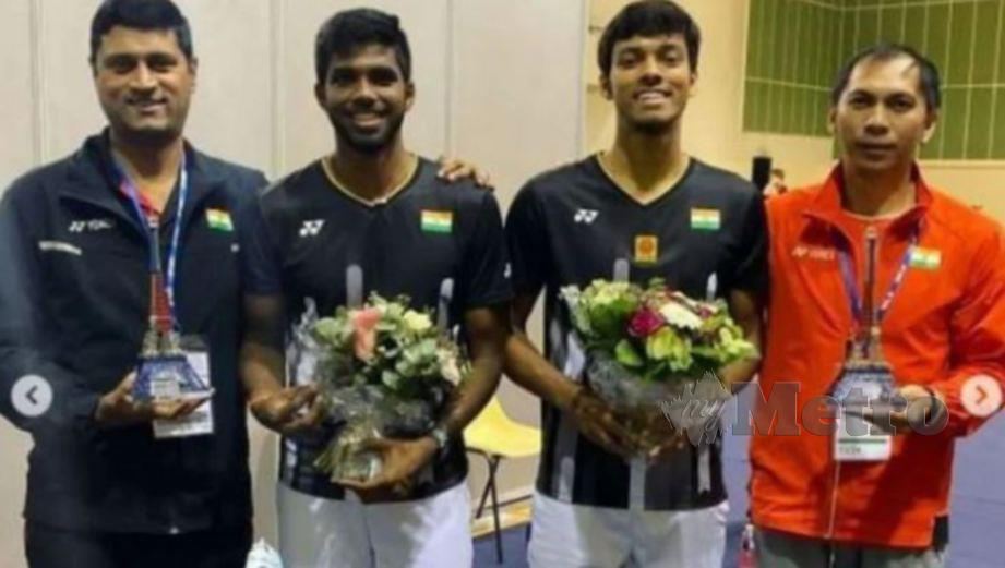 Flandy Limpele (kanan) berpengalaman membimbing skuad badminton India. 