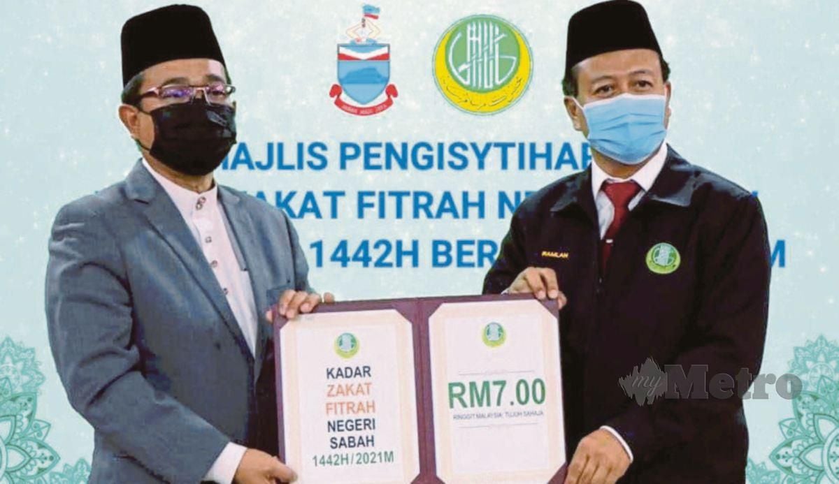 BUNGSU (kiri) menunjukkan kadar jumlah zakat sebanyak RM7. FOTO ihsan Muis