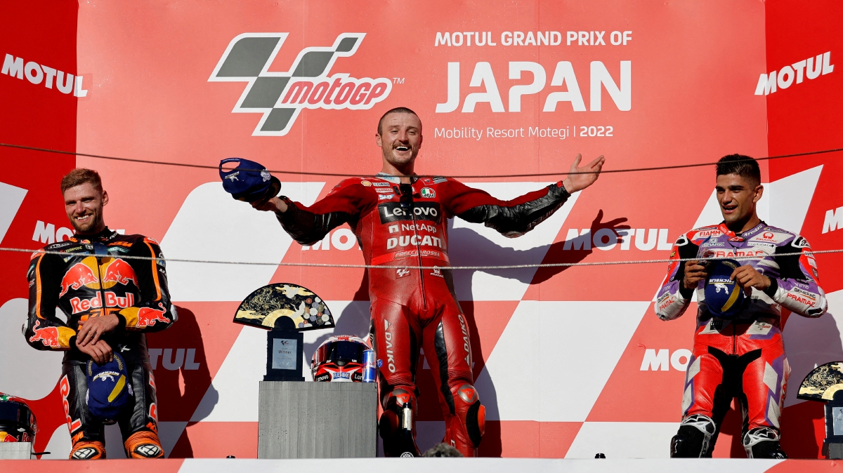 PELUMBA Ducati Lenovo, Jack Miller (tengah) meraikan kemenangannya di MotoGP Jepun di Litar Motegi, hari ini. FOTO Reuters 