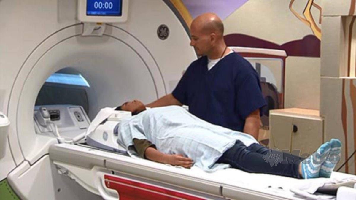 FUNGSI MRI untuk menghasilkan imej struktur dalaman badan. 