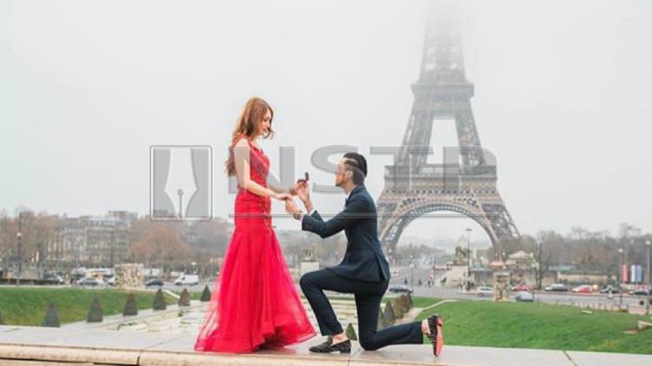 NADIA Brian dilamar kekasihnya, Muizz Nasruddin di hadapan Menara Eiffel, Paris. FOTO Instagram Nadia Brian