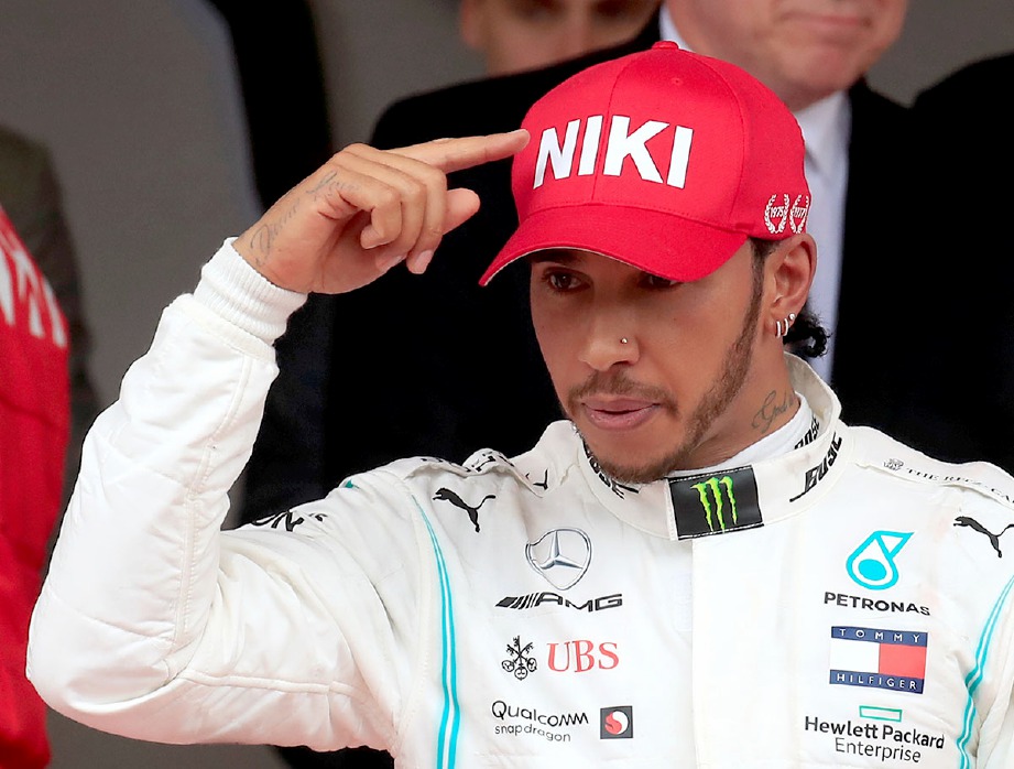 REAKSI Hamilton selepas memenangi perlumbaan di GP Monaco. FOTO Reuters