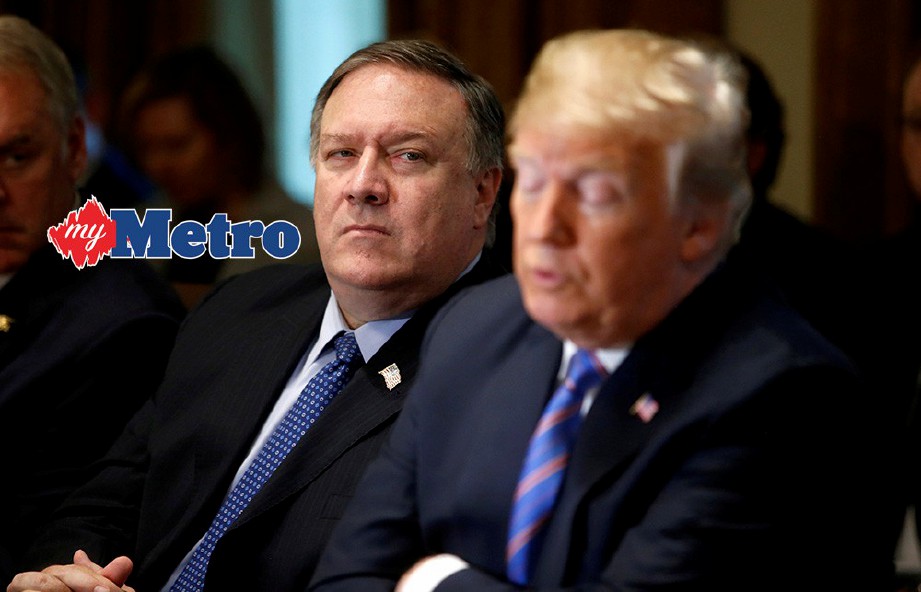 POMPEO (kiri) membatalkan lawatan ke Korea Utara atas arahan Trump. FOTO/AFP 