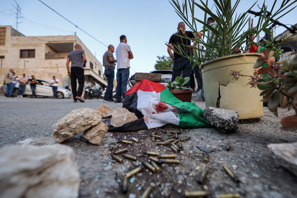 LOKASI tiga rakyat Palestin dibunuh tentera Israel, pada Jumaat. FOTO AFP