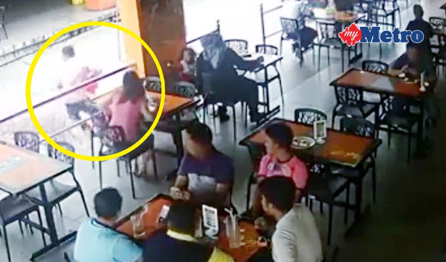 RAKAMAN CCTV yang menunjukkan seorang lelaki melarikan beg milik seorang wanita  di sebuah restoran di Taman Equine, Seri Kembangan. FOTO NSTP