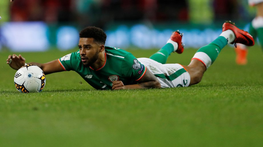 CHRISTIE terima kecaman berbaur perkauman selepas jaring gol sendiri yang mengakibatkan Ireland tersingkir pada aksi play-off. -Foto Reuters