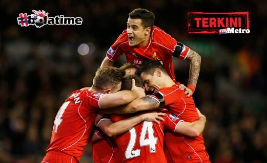 JOE Allen merai gol kedua Liverpool bersama Philippe Coutinho dan rakan sepasukan. FOTO Reuters