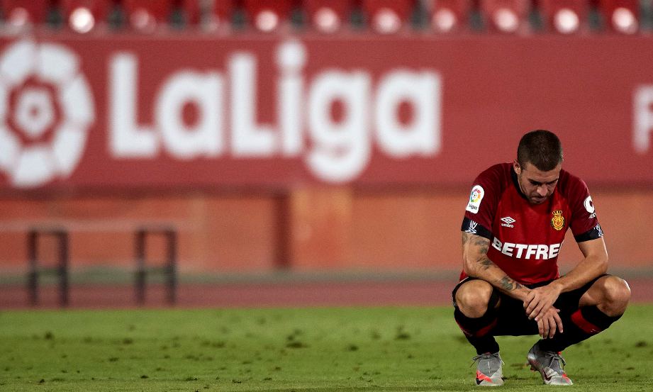 DANI Rodriguez kecewa selepas kelabnya tersingkir dari La Liga. FOTO Agensi
