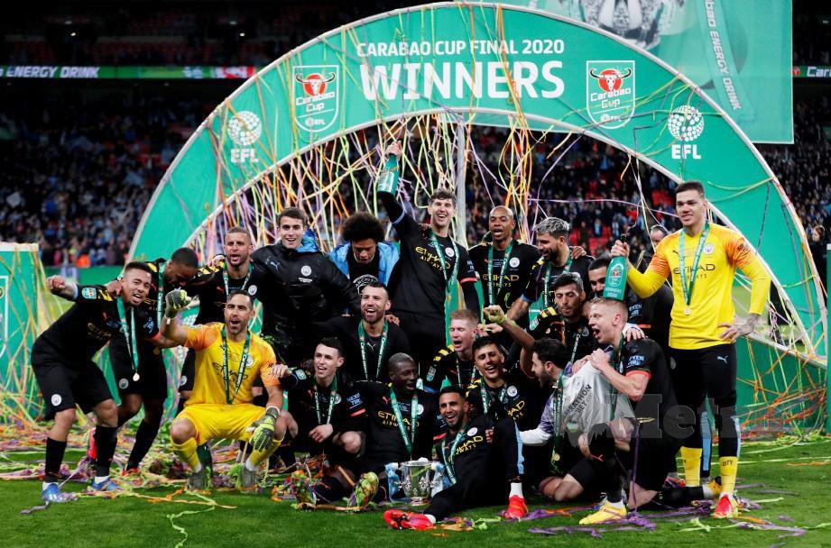 Pemain Manchester City meraikan kejayaan muncul juara Piala Liga. FOTO Reuters