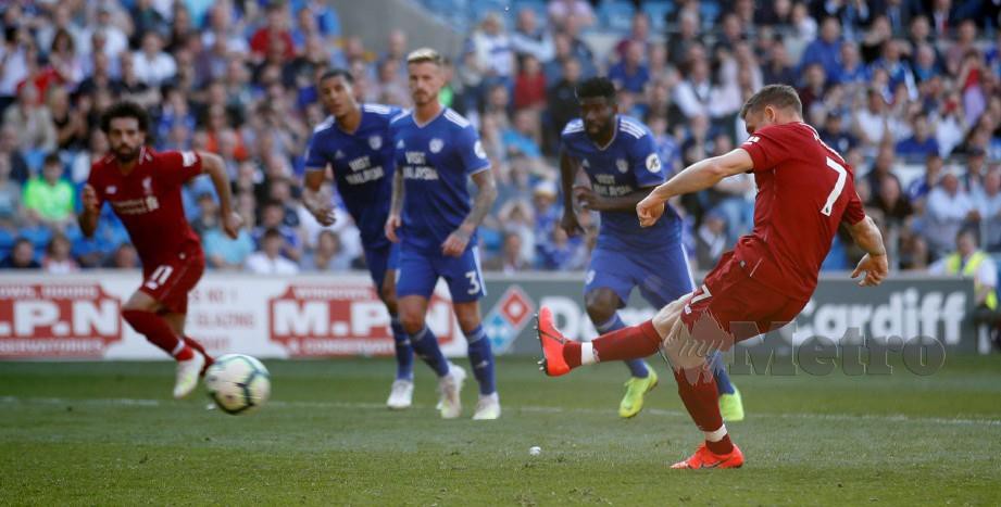 MILNER menyempurnakan sepakan penalti ketika menentang Cardiff. - FOTO Reuters 