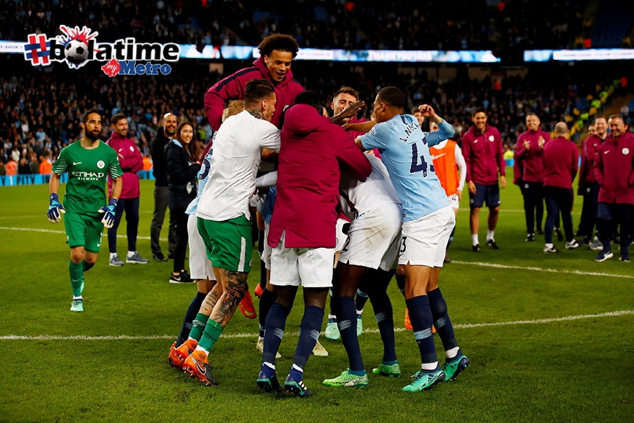 PEMAIN City meraikan kemenangan. FOTO/AFP 