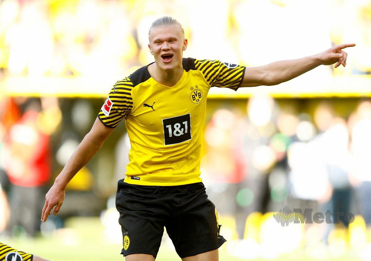 HAALAND ledak dua gol ketika Dortmund membelasah Wolfsburg 6-1. -FOTO Reuters