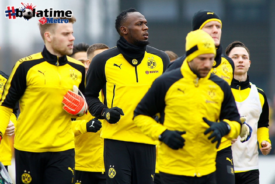 PELARI pecut dunia, (tengah) ketika berlatih dengan Dortmund. FOTO/REUTERS  