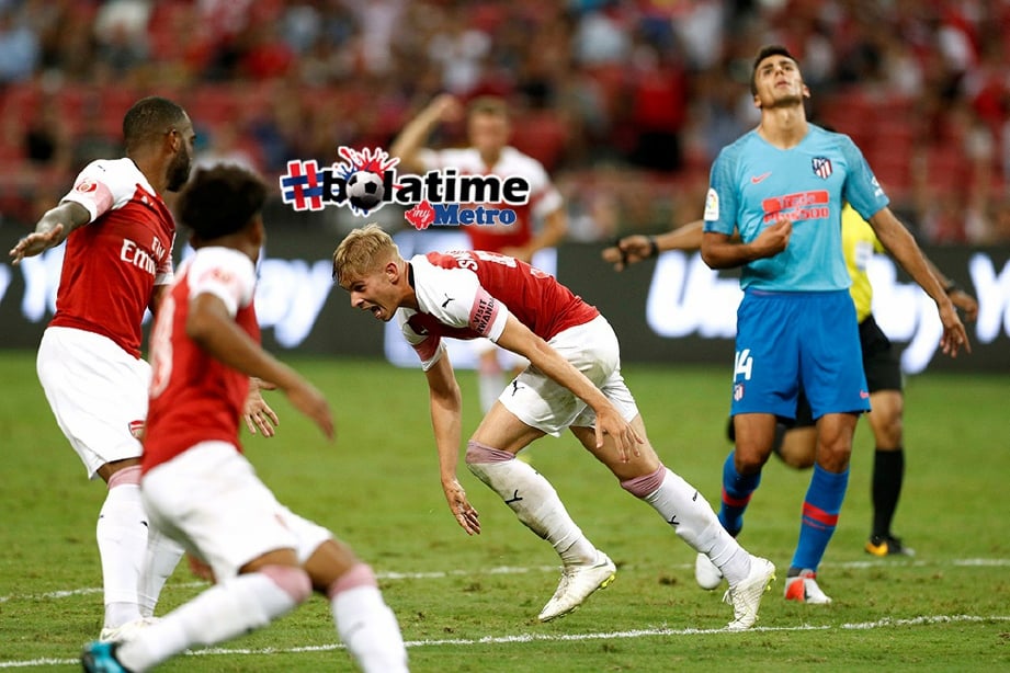 ROWE (tengah) ketika menjaringkan gol Arsenal. FOTO/REUTERS  