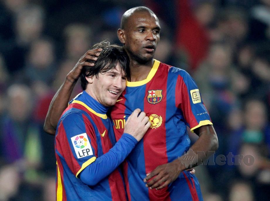 MESSI dan Abidal ketika beraksi bersama Barcelona pada 2011. FOTO Reuters