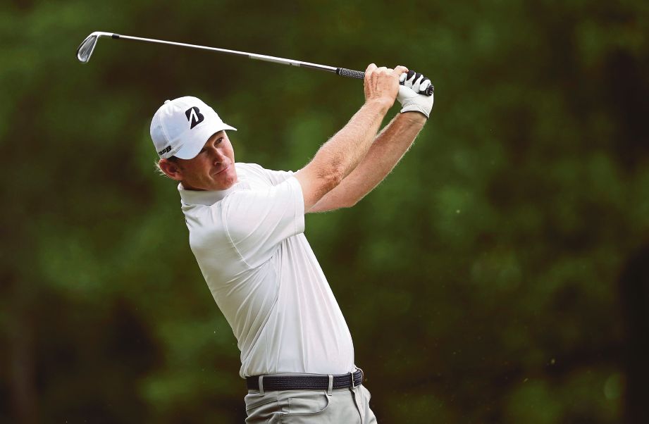 PEMAIN golf Amerika Syarikat, Brandt Snedeker kekal kelebihan tiga pukulan apabila pemainan pada pusingan ketiga golf Kejuaraan Wyndham. FOTO AFP
