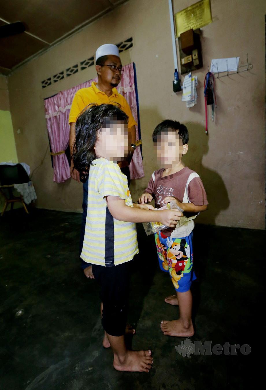 KANAK-kanak berusia lima tahun (kiri) dan tiga tahun (kanan) ditemui dalam kelaparan. FOTO Khairunisah Lokman