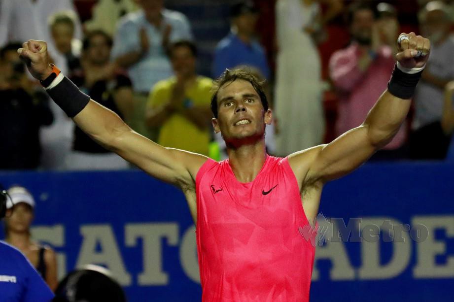Rafael Nadal meraikan kejayaan mara ke final. FOTO Reuters