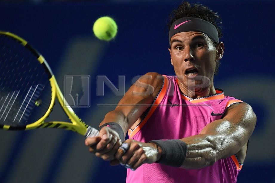 Aksi Rafael Nadal di Terbuka Mexico. FOTO AFP