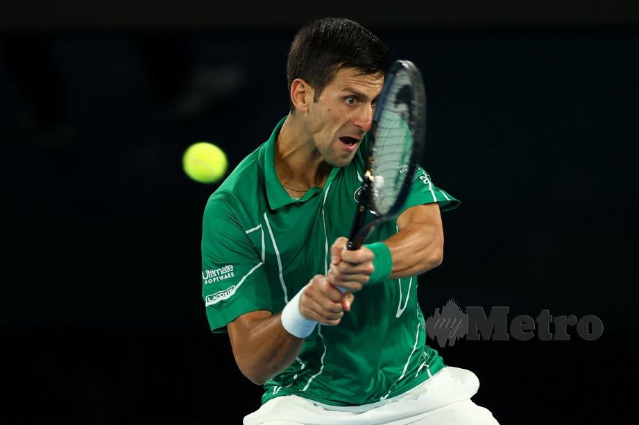 AKSI Djokovic ketika menentang Raonic. FOTO Reuters 
