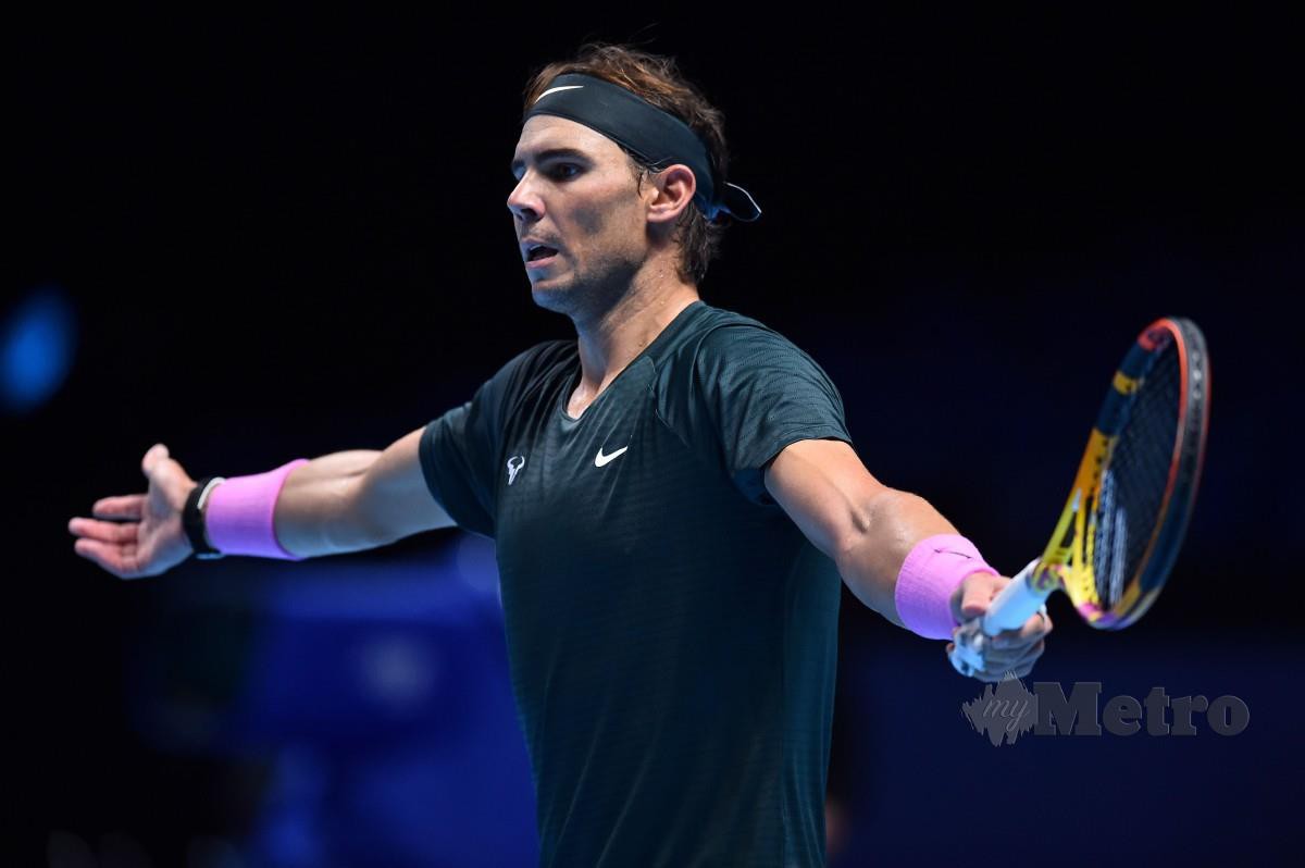 Reaksi Rafael Nadal ketika berdepan Dominic Thiem pada aksi ATP Finals di O2 Arena, London. FOTO AFP