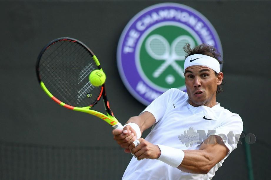 Aksi Rafael Nadal di Wimbledon. FOTO AFP