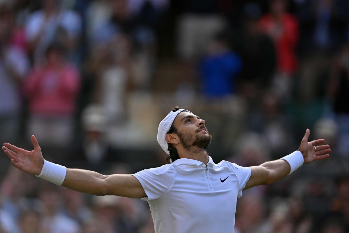 MUSETTI meraikan kejayaannya mara ke separuh akhir Wimbledon. -FOTO AFP 