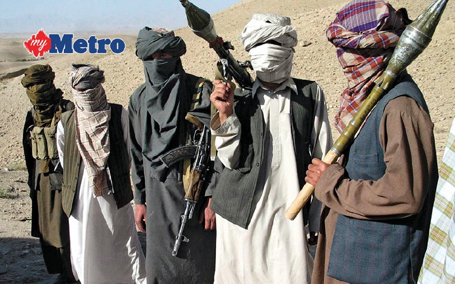 DIKATAKAN polis bunuh lapan rakan ingin sertai Taliban. FOTO/AGENSI 
