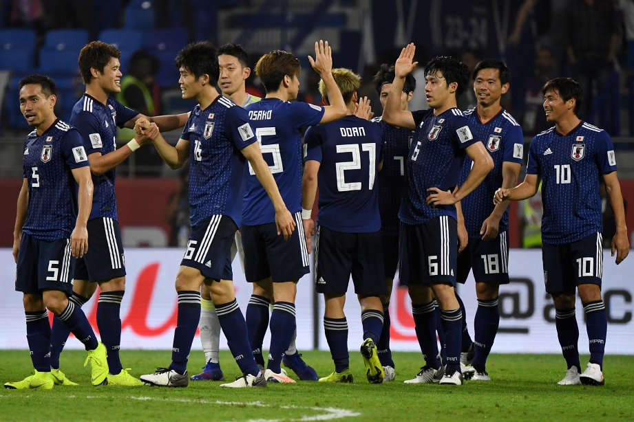 PEMAIN Jepun meraikan kejayaan mara ke separuh akhir selepas tewaskan Vietnam 1-0. FOTO EPA