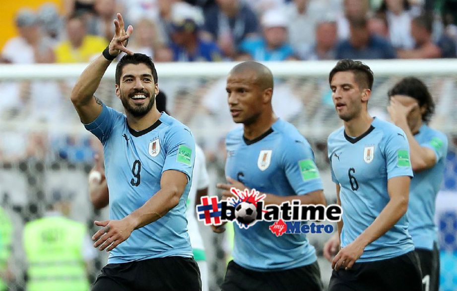 PASUKAN Uruguay antara yang sudah menempah tiket ke pusingan kalah mati Piala Dunia 2018. Foto REUTERS 