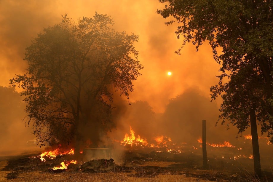 ANTARA kawasan yang terbakar. FOTO AFP 